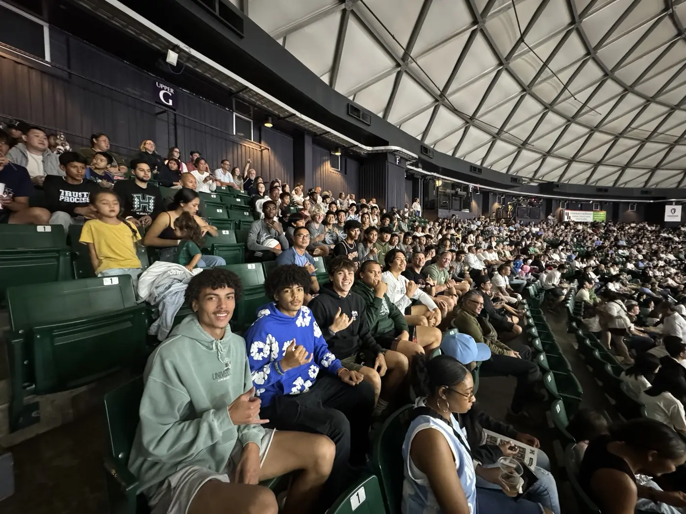 Moanalua Boys Basketball players attending a community basketball event together