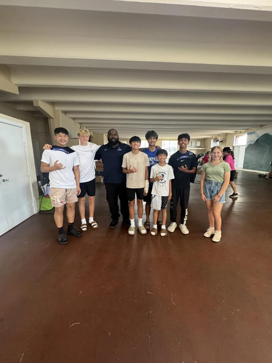 Moanalua Boys Basketball volunteers gathered after helping with a community distribution project
