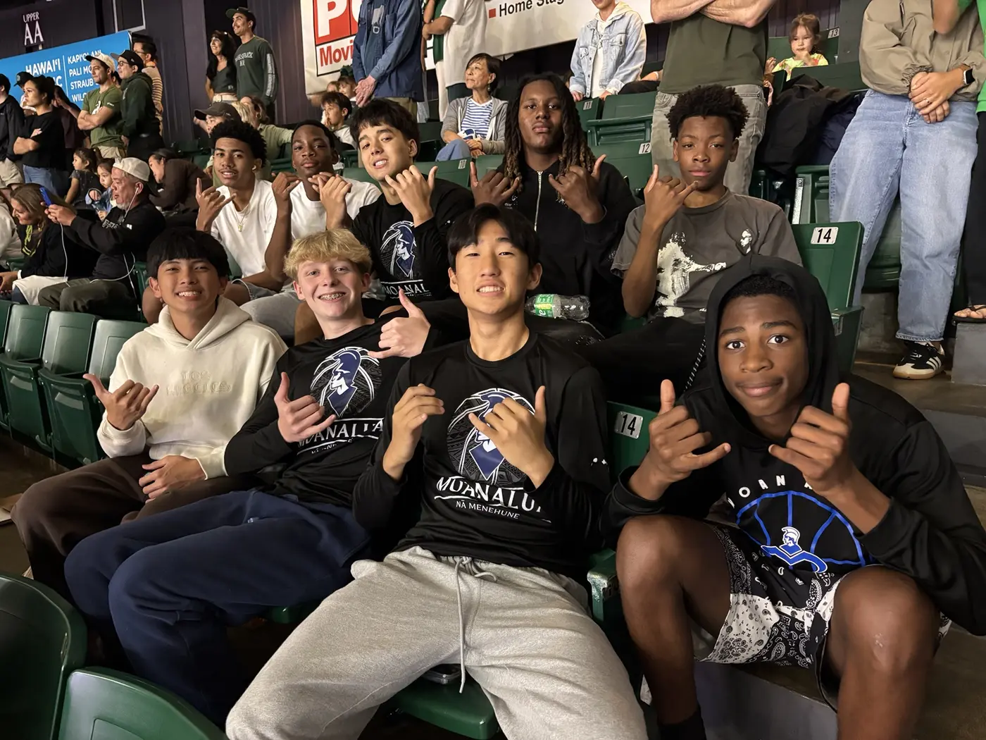 Moanalua Boys Basketball student-athletes attending a community event together