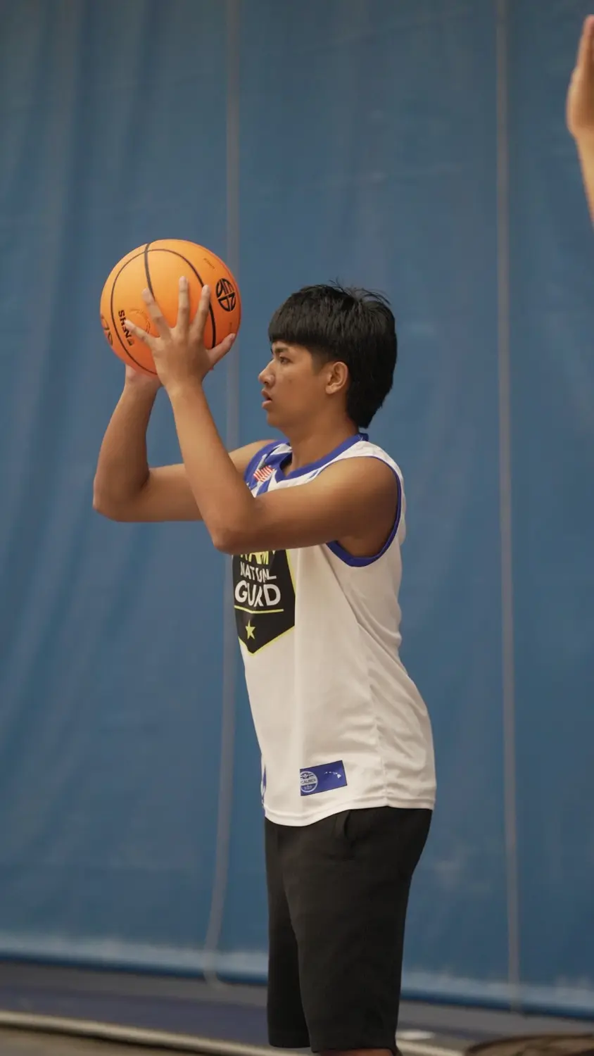 Varsity: Moanalua Fall League player focused at the free-throw line