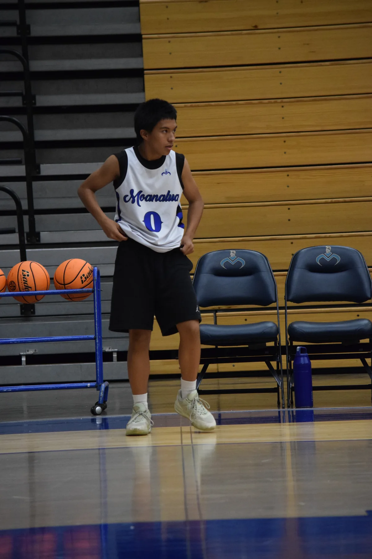 Junior Varsity: Player with the ball near the sideline
