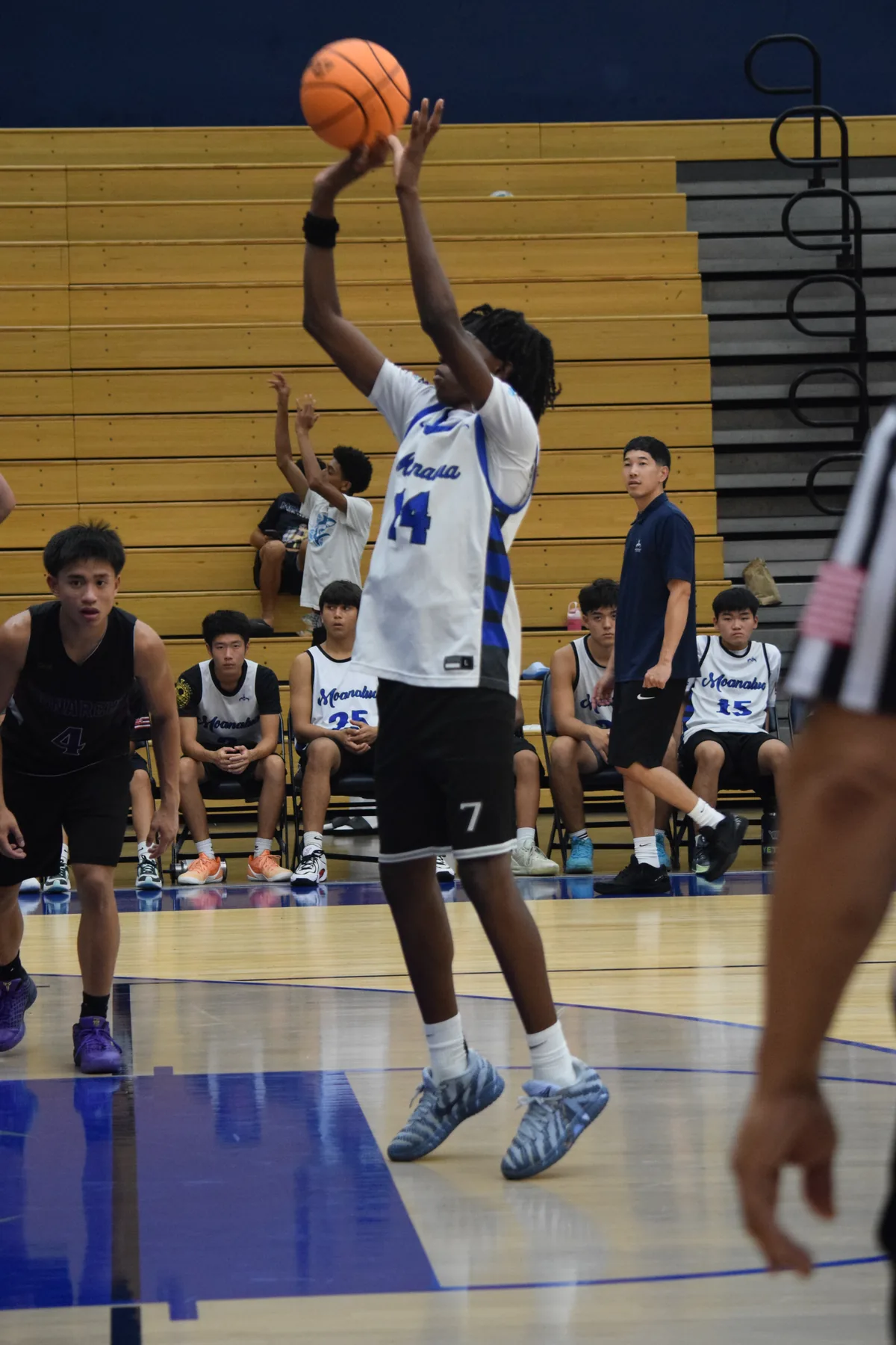 Junior Varsity: Player shooting during a game